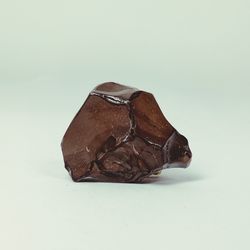 Close-up of chocolate cake against white background