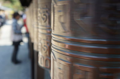 Close-up of text on metal in city