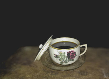 Close-up of tea cup on table