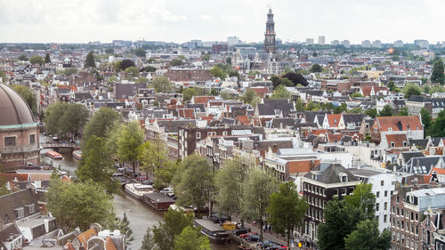 High angle view of street amidst buildings in town