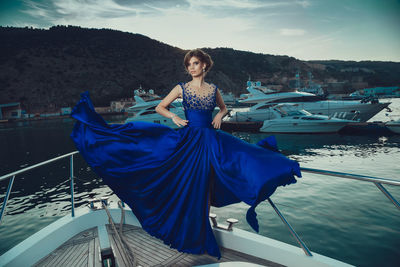 Portrait of young woman in boat