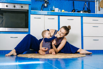 Healthy snacks for babies and toddlers. happy loving family. candid young mother feeding her cute