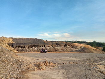 Scenic view of land against sky