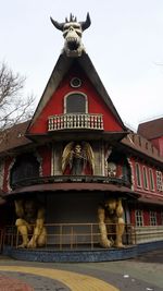 Low angle view of statue against building