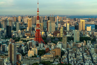 Aerial view of tower and buildings in city