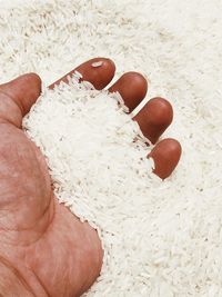 Close-up of hand holding bread