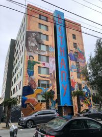 Low angle view of building against sky in city