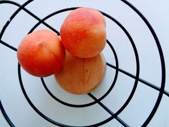 High angle view of oranges in bowl on table