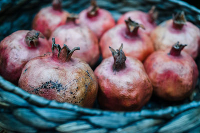 Close-up of pomegranates in basket