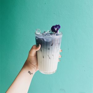 Close-up of hand holding drink