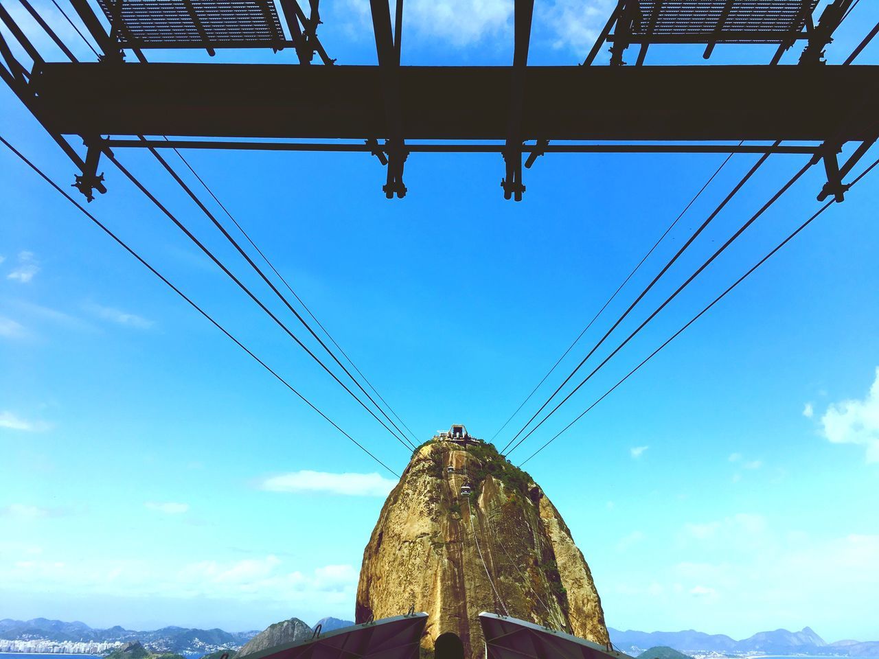 low angle view, sky, blue, no people, built structure, day, architecture, outdoors