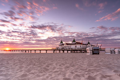 Scenic view of beach against sky during sunset