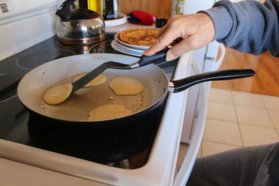 Close-up of person preparing food