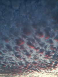 Low angle view of dramatic sky during sunset