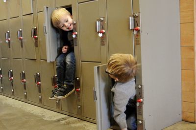 Boys hiding in lockers