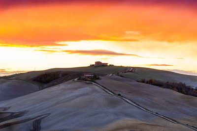 View of road against sky during sunset