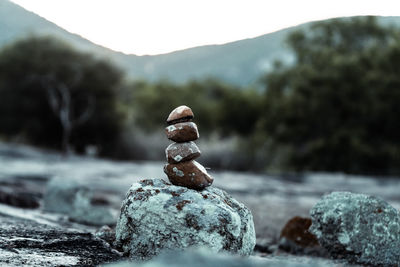 Close-up of stone stack on rock
