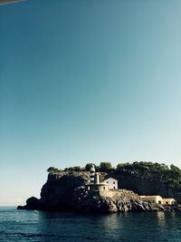 Scenic view of sea against blue sky