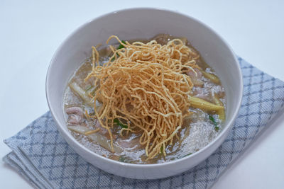 Close-up of noodles in bowl on table