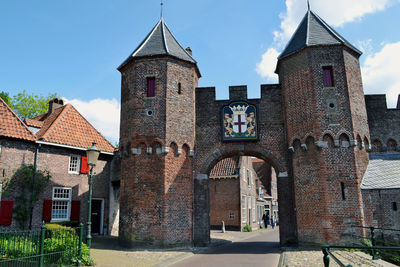 Low angle view of old building against sky