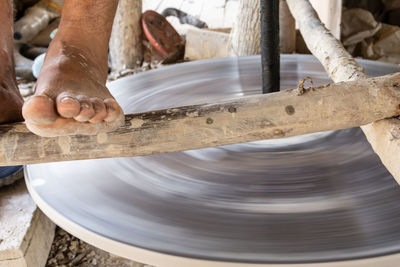 An artisan is seen making ceramic works in maragogipinho in the city of aratuipe, bahia.