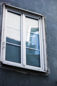 Low angle view of window of building in gdansk poland 