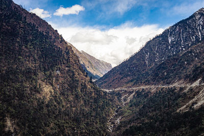 Himalaya mountain valley with bright blue sky at day from hilltop