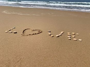 Heart shape on sand at beach