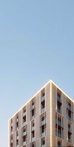 Low angle view of modern building against clear sky