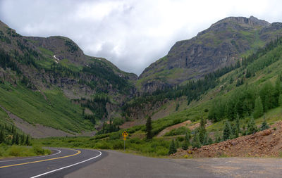 Country road leading towards mountains