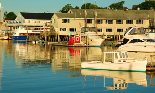 Boats moored in lake