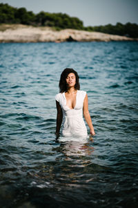 Young woman in sea