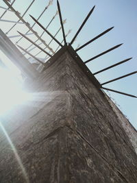 Low angle view of wind turbine against sky