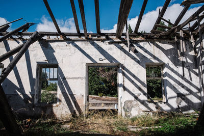 Abandoned building against sky