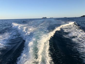 Scenic view of sea against clear sky