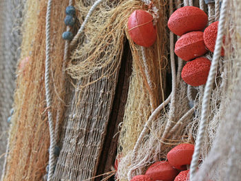 Close-up of red hanging on wall