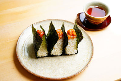 Onigiri with umeboshi and green tea