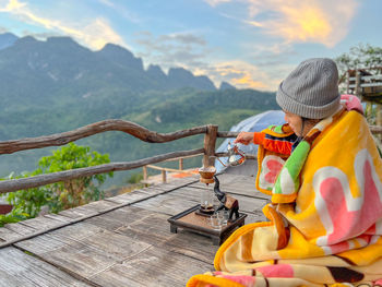 Tourists making coffee using a kettle