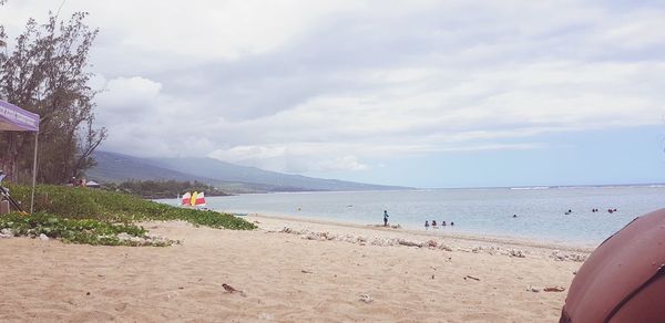 Scenic view of beach against sky