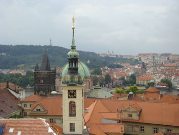 High angle view of buildings in city against sky