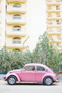 Vintage car against building