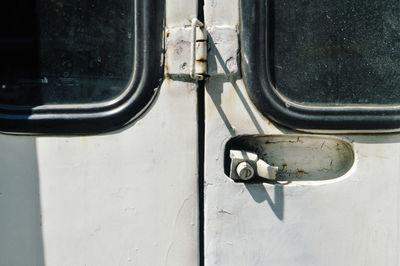 Close-up of abandoned car window