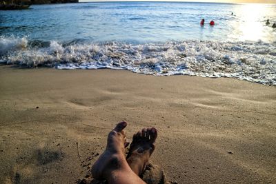 Low section of woman on beach