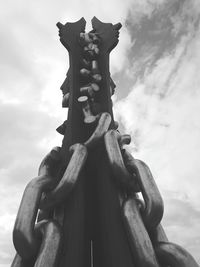 Low angle view of statue against sky