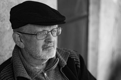 Close-up of man wearing cap