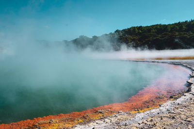 Smoke emitting from volcanic mountain