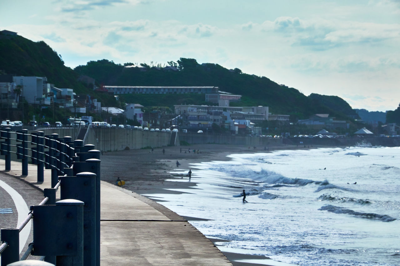 water, sea, sky, nature, coast, architecture, mountain, winter, snow, ocean, built structure, land, beach, travel destinations, day, outdoors, cloud, no people, city, building exterior, shore, travel, environment, beauty in nature, scenics - nature, transportation, cold temperature