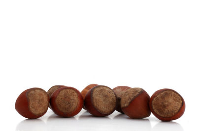 Close-up of fruits against white background