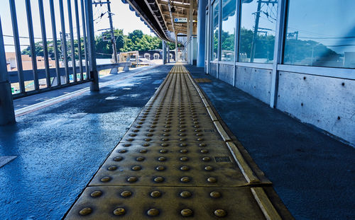 Surface level of footpath by station in city