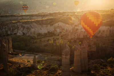 View of hot air balloons on rock